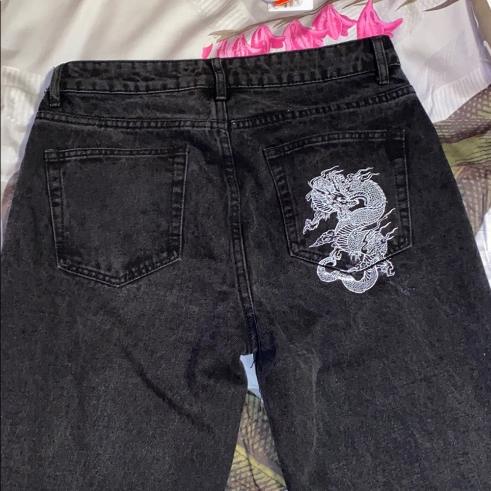 Black mom jeans with dragon graphic